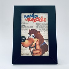 Usado, Banjo Kazooie N64 Nintendo videogame pôster promocional emoldurado raro anúncio impresso dos anos 90 comprar usado  Enviando para Brazil