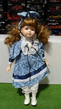 Poupee porcelaine couleur d'occasion  Rochefort-Montagne