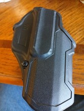 **Usado** Coldre BLACKHAWK L3D T SERIES RH GLOCK 17/19/22/23/31/32/45 Ver Informações comprar usado  Enviando para Brazil