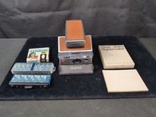 Usado, Câmera Land Polaroid SX-70 com estojo rígido de couro/não testada com lâmpadas de flash de filme comprar usado  Enviando para Brazil