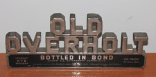 Old Overholt Whiskey~Bottled In Bond 1930s placa de exibição de bar madeira e estanho; 10"x4.5 comprar usado  Enviando para Brazil