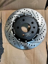 Rotor de freno semiflotante ranurado perforado cruzado trasero ECS Tuning 000036ECS02A-01 segunda mano  Embacar hacia Mexico