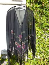 Poncho habillé noir d'occasion  Mauvezin