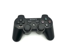 Manette dualshock noire d'occasion  Les Mureaux