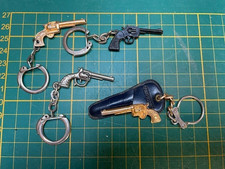 Porte clefs pistolet d'occasion  Montfort-l'Amaury