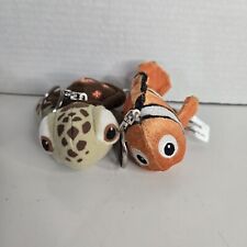 Lote de 2 Llaveros de Peluche Vintage Disneyland Buscando a Nemo Tortuga Pez Payaso segunda mano  Embacar hacia Argentina