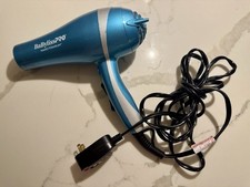 Secador de cabelo Babyliss Pro Nano titânio 1,75” LA5S azul cromado iônico profissional comprar usado Secador de cabelo Babyliss Pro Nano titânio 1,75” LA5S azul cromado iônico profissional comprar usado  Enviando para Brazil