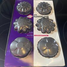 Panela de bolo Wilton 6 mini cavidades em forma de molde flores pesadas bolos florais comprar usado Panela de bolo Wilton 6 mini cavidades em forma de molde flores pesadas bolos florais comprar usado  Enviando para Brazil