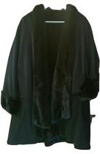 Manteau double fourrure d'occasion  Suresnes