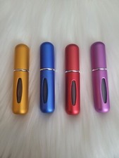 Four refillable portable for sale  Davenport