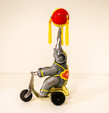 Bola giratória vintage elefante em bicicleta brinquedo de corda estanho metal [funcionando] comprar usado  Enviando para Brazil