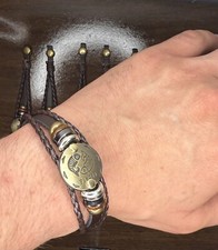 Pulseira trançada de couro temática do zodíaco com detalhes metálicos  comprar usado  Enviando para Brazil