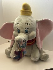 RARO Disney Dumbo Grande 20 em Sentado com Flor Brilhante no Baú comprar usado RARO Disney Dumbo Grande 20 em Sentado com Flor Brilhante no Baú comprar usado  Enviando para Brazil