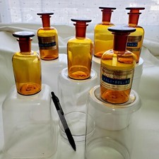 Garrafa de vidro marrom âmbar boticário com tampa de vidro vintage disco a granel 4,5"h X 2"w comprar usado Garrafa de vidro marrom âmbar boticário com tampa de vidro vintage disco a granel 4,5"h X 2"w comprar usado  Enviando para Brazil