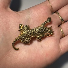 Broche guépard dorée d'occasion  Andernos-les-Bains