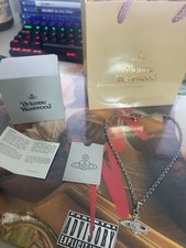 Collier chaine vivienne d'occasion  Igoville