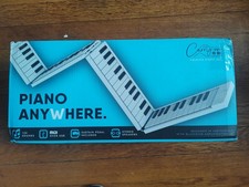 Piano plegable de 88 teclas y controlador MIDI blanco segunda mano  Embacar hacia Mexico
