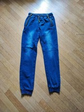 Pantaloni tuta jeans usato  Venegono Superiore