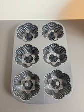 Nordic Ware 6 mini Bundt Festival Muffin Bundtlette, 1 taza porciones cada uno segunda mano Nordic Ware 6 mini Bundt Festival Muffin Bundtlette, 1 taza porciones cada uno segunda mano  Embacar hacia Mexico