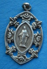 Medaille religieuse vierge d'occasion  Saint-Jean-d'Angély