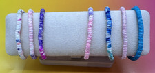 Pulseiras multicoloridas falsas 7 PUCA SHELL elegantes e confortáveis bom alongamento 7" comprar usado  Enviando para Brazil