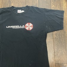 Camiseta promocional rara vintage Resident Evil Umbrella Corporation 2004 videogame G, usado comprar usado  Enviando para Brazil