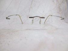 Armação de óculos Adidas feminina A775-40-6064 cinza metal retangular sem aro 19-35 comprar usado Armação de óculos Adidas feminina A775-40-6064 cinza metal retangular sem aro 19-35 comprar usado  Enviando para Brazil