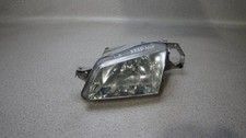 Mazda 323 F 1999 przedni lewy reflektor AOP32330 na sprzedaż  PL