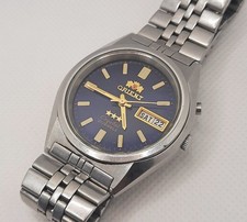Relógio automático ORIENT Lume Indexes mostrador azul escuro 21 joias EM05-C4-A comprar usado  Enviando para Brazil