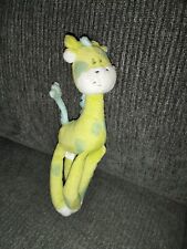 Doudou girafe verte d'occasion  Avion