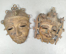 Paire masques bronze d'occasion  Yffiniac