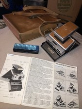 Usado, Câmera Land Polaroid SX-70 com Estojo de Couro com Instruções + Estojo + Cubo de Flash Antigo comprar usado  Enviando para Brazil
