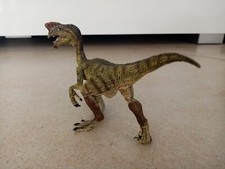 Oviraptor dinosauro papo usato  Calcinaia
