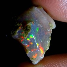 Opala etíope natural áspera com espécime colorido multifogo 19,60 ct., usado comprar usado  Enviando para Brazil