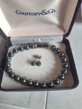 Ensemble boucle oreilles d'occasion  Quingey