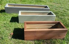 Coloured wooden planter for sale Coloured wooden planter for sale  NORTH WALSHAM