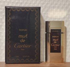 Parfum must cartier d'occasion  Châtillon-Coligny