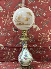 Lampe petrole faience d'occasion Lampe petrole faience d'occasion  Luzancy
