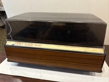 Sistema de videogame vintage ATARI 2600 centro organizador plástico com tampa grão de madeira comprar usado Sistema de videogame vintage ATARI 2600 centro organizador plástico com tampa grão de madeira comprar usado  Enviando para Brazil