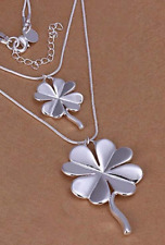 Double pendentif trèfle d'occasion Double pendentif trèfle d'occasion  Bordeaux-