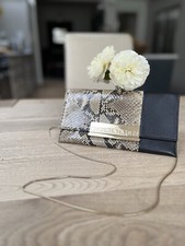 Carolina herrera python for sale  LONDON