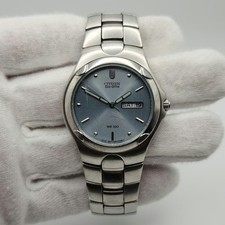 Citizen Eco-Drive relógio de quartzo solar masculino tom prata com mostrador azul dia/data, usado comprar usado  Enviando para Brazil