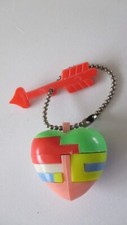 Puzzle keychain 1960s d'occasion  Expédié en Belgium
