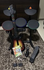 Pacote Guitar Hero PlayStation PS3 com guitarra, bateria, dongles e jogo (testado) comprar usado  Enviando para Brazil