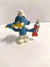 Puffo con dentifricio usato  Savigliano