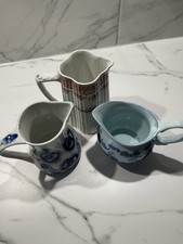 Three milk jugs for sale  LIVINGSTON