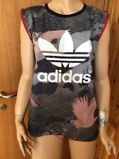 Camiseta túnica Adidas X Rita Ora tamanho 10 manga quimono inspiração japonesa sem mangas comprar usado  Enviando para Brazil