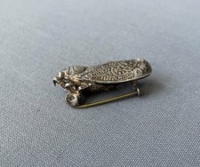 Broche forme cigale d'occasion  Artigues-près-Bordeaux