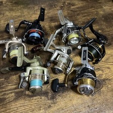 Conjunto de 7 molinetes de pesca: venda a granel Shimano e Daiwa, vários modelos comprar usado  Enviando para Brazil