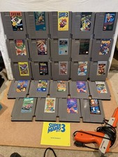 Sistema de entretenimiento Nintendo NES con 24 juegos, 3 mandos, Zapper, folleto segunda mano  Embacar hacia Mexico